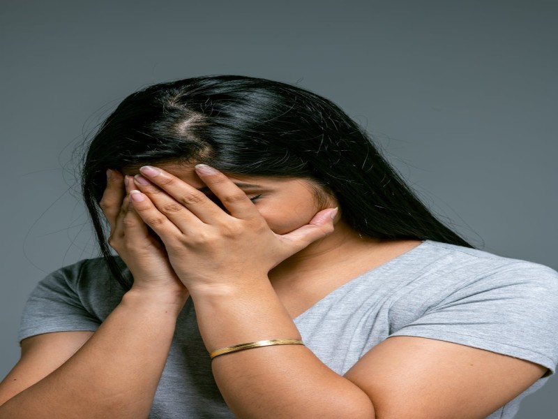 Person practicing mindfulness for stress relief and emotional fitness
